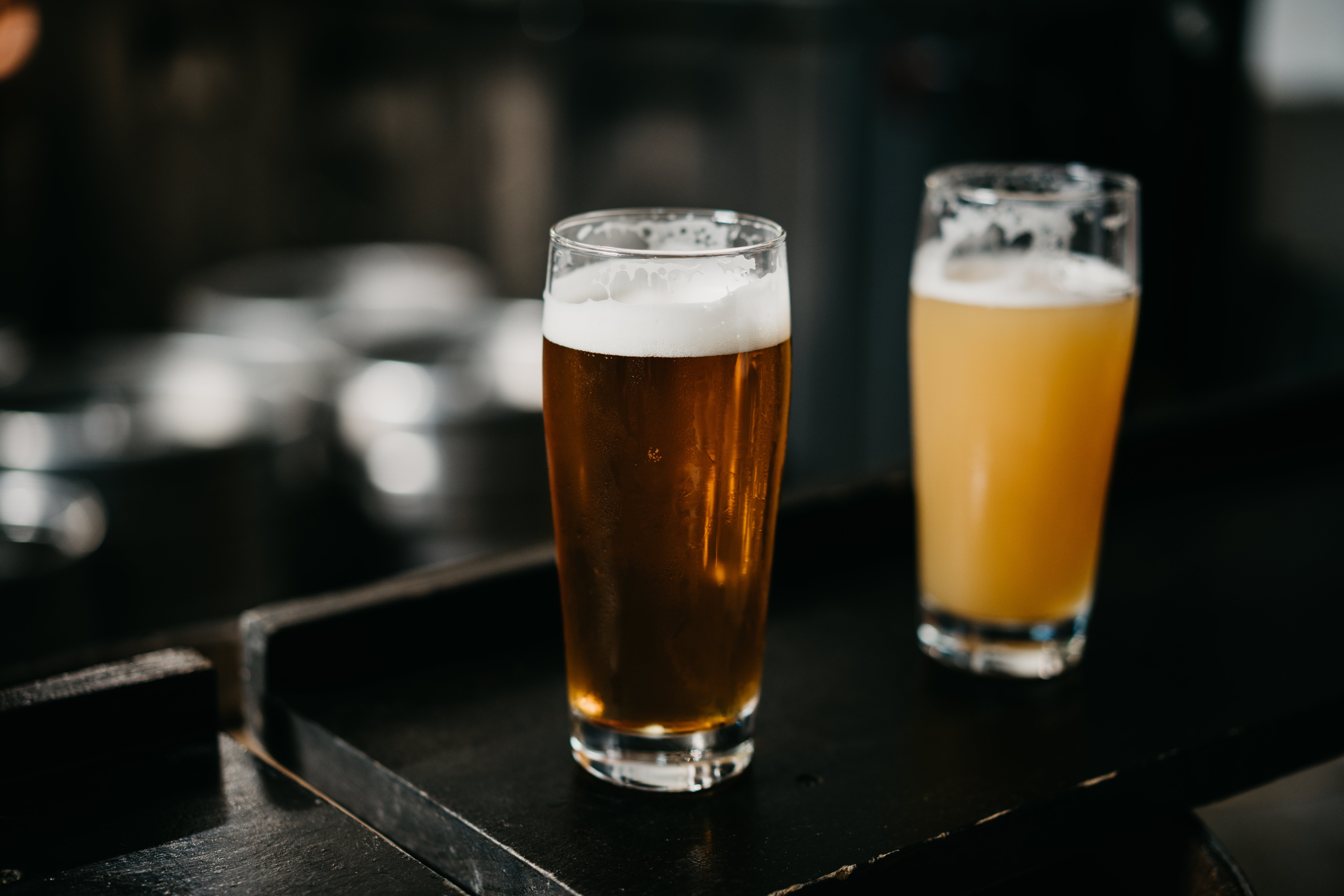 beer-glasses-moody-brewery-bar-top-amber-golden-al-2022-11-11-09-54-03-utc